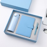 Notebook with metal pen and water bottle