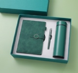 Notebook with metal pen and drink bottle